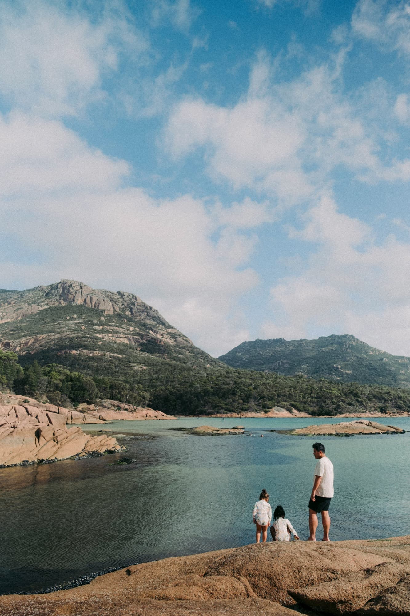 Family fishing on a lake together